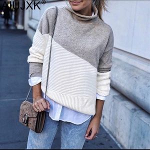 Grey and creme turtle neck sweater. Brand new